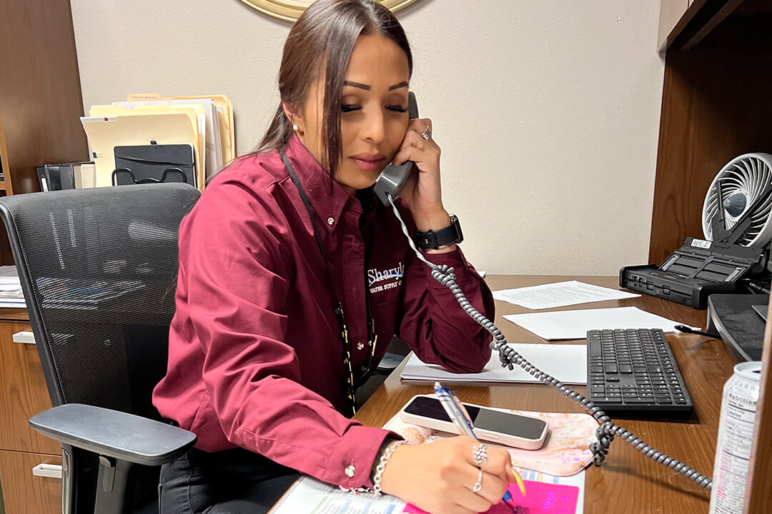 Sharyland customer service representative assisting a caller